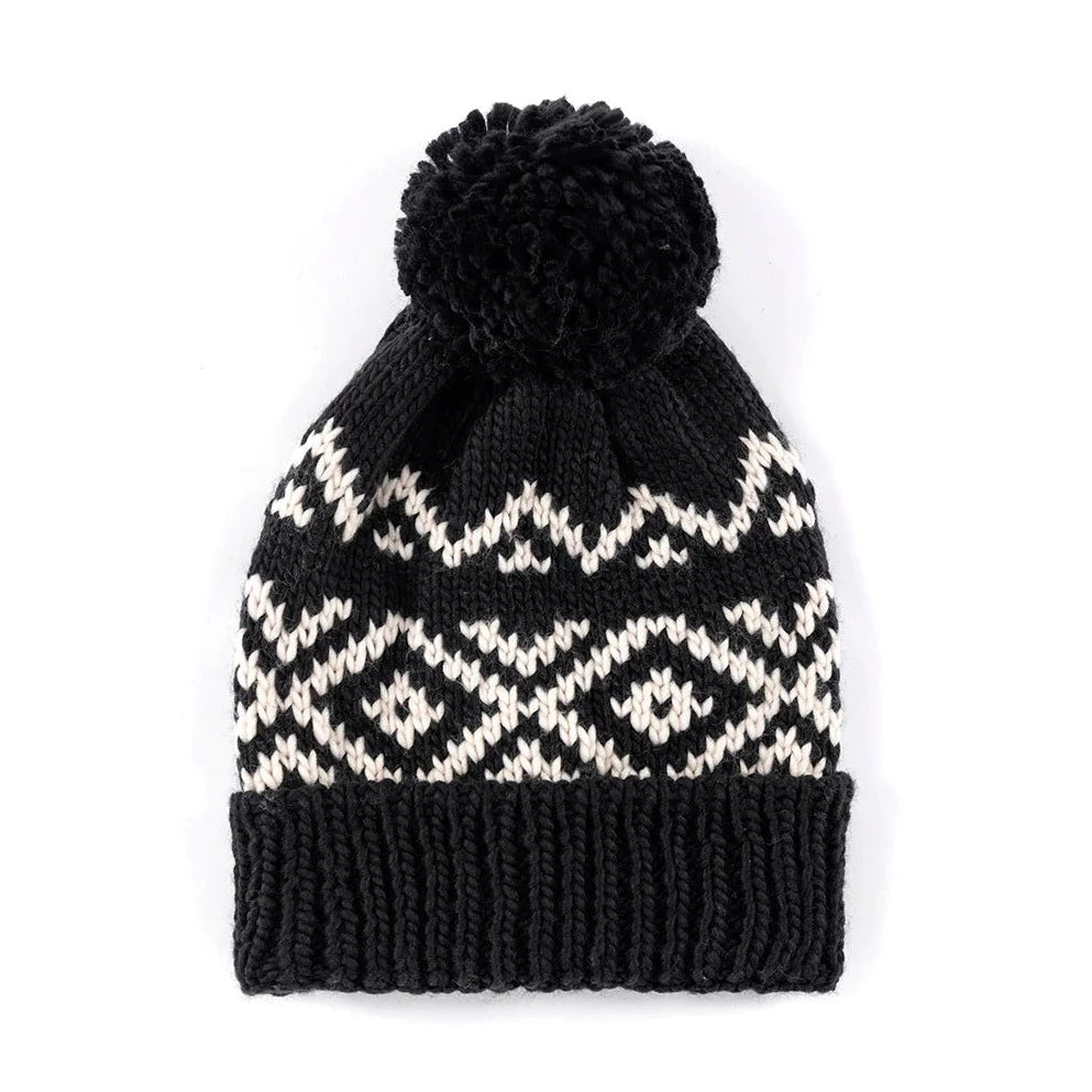 Spruce up your cold weather accessories in Shiraleah’s Andrea hat. This hat features a cozy ribbed knit texture with a black and white pattern making this a great addition to any winter outfit. Made from acrylic and including pompom detailing, the Andrea hat will keep you cozy and chic during the cold winter months.