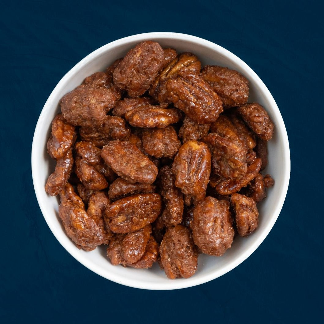 Crisply coated praline pecans with a truly sweet Canadian touch. The perfect topper for salads, ice cream, or baked brie.
