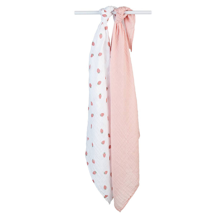 Lulujo Baby 2-pack cotton swaddle blankets with strawberry and ballet slipper patterns, soft and breathable for newborns.