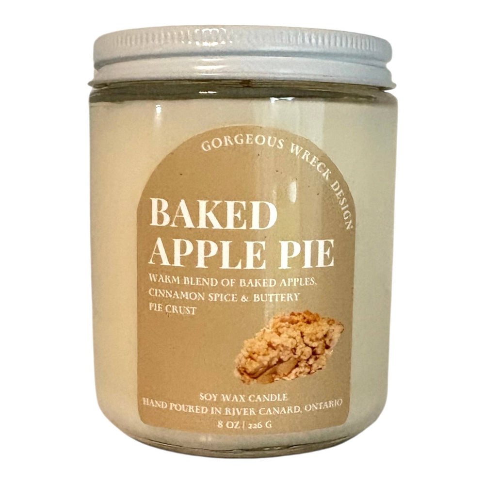 Jar of 'Baked Apple Pie' candle with a label on a white background