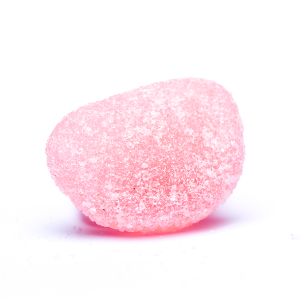 Pink jelly candy on a white background