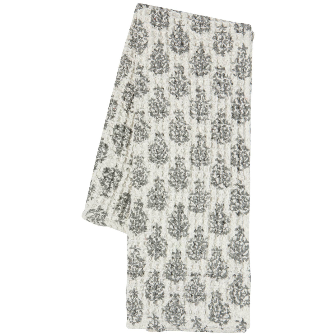 Folded fabric with a floral pattern on a white background
