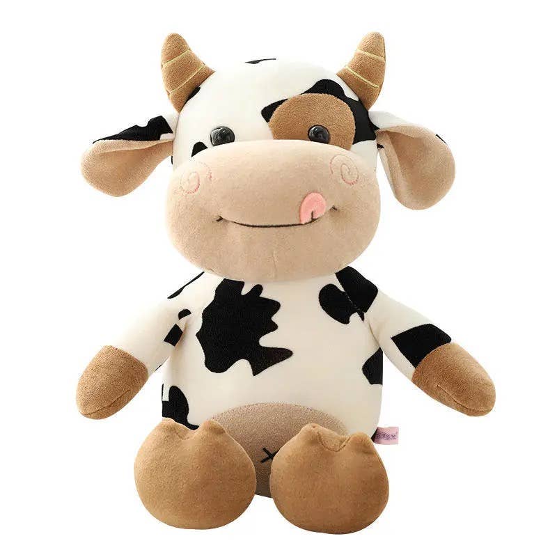 Plush cow toy with black and white pattern on a white background