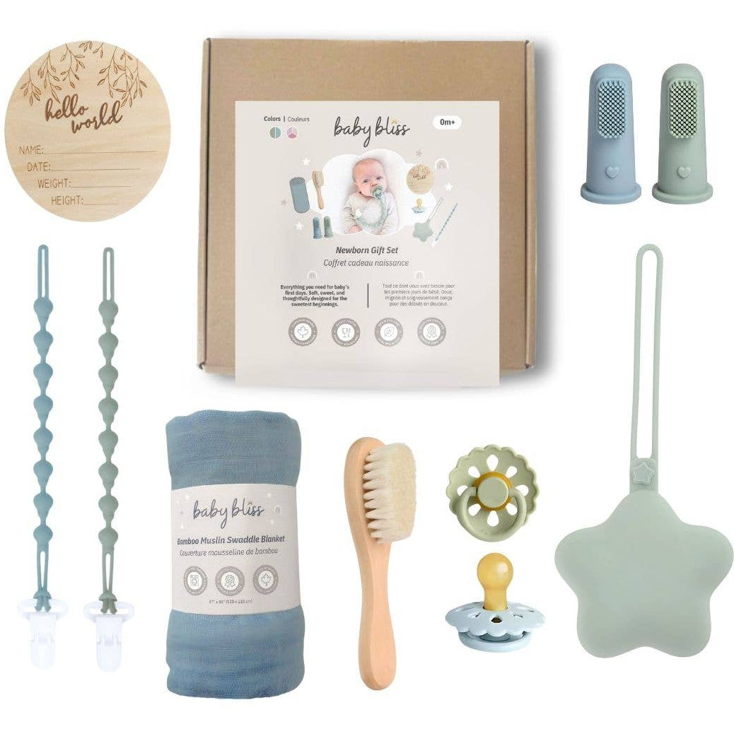 Baby product set with various items including a blanket, brush, and teether, displayed against a white background.