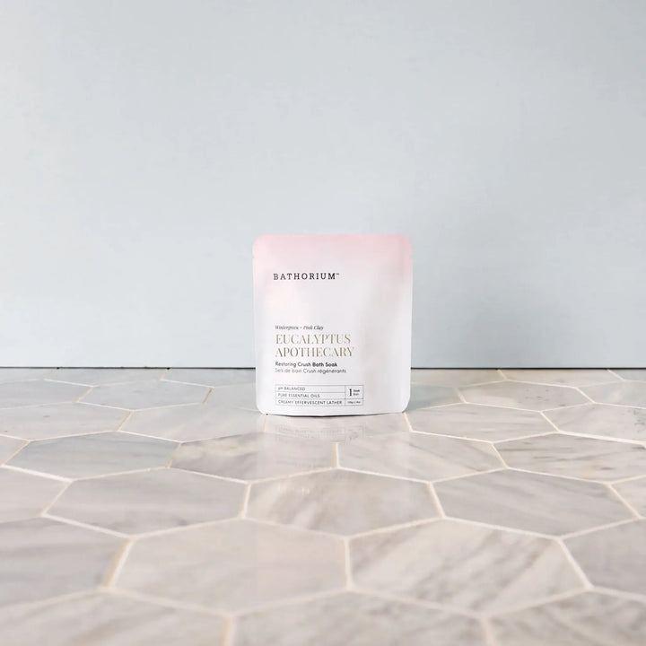 Bathorium Eucalyptus Apothecary product on a tiled floor with a light gray background