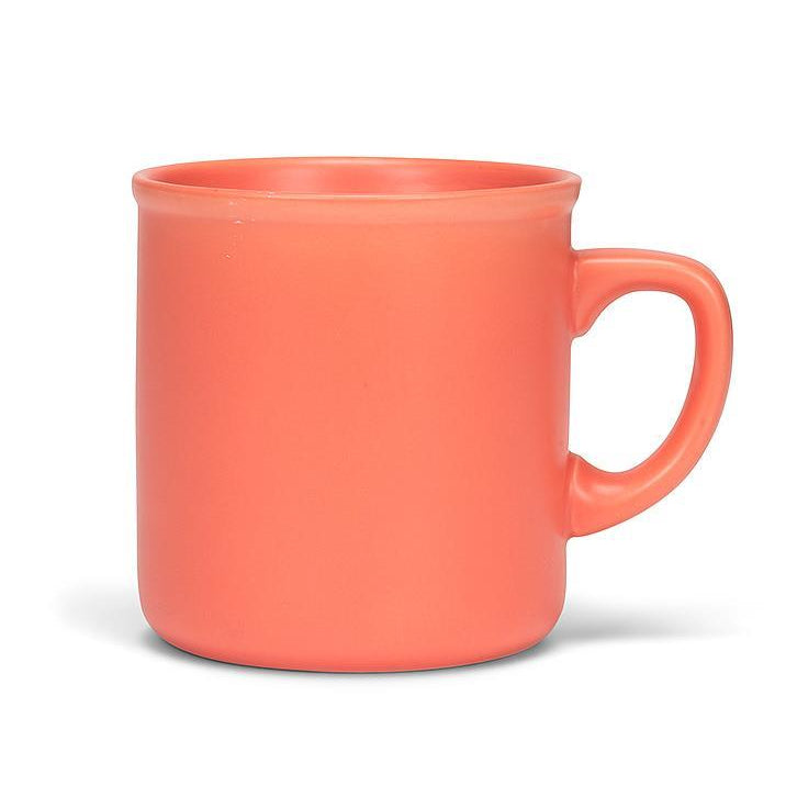 Coral mug on a white background