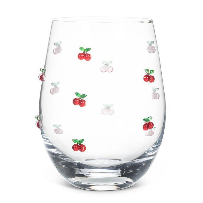 Clear glass with cherry designs on a white background