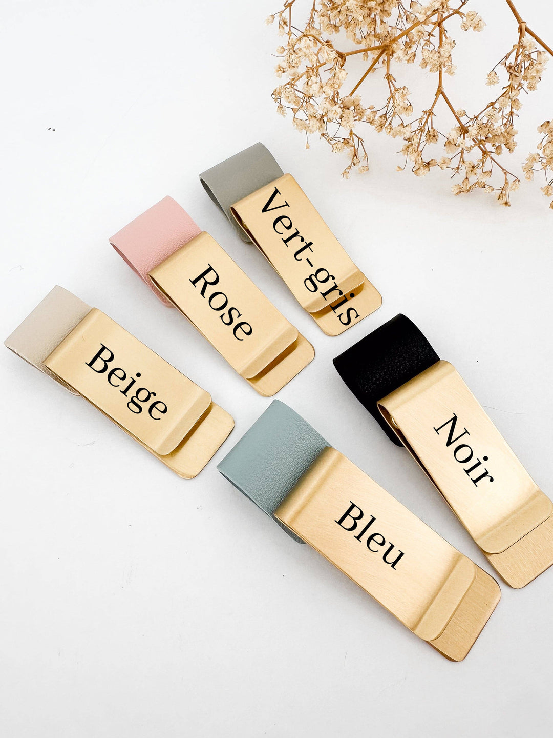 Set of gold color swatches with labels on a light background