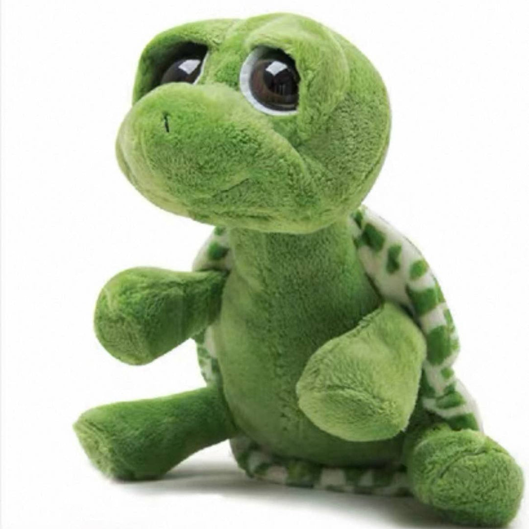 Green plush turtle toy on a white background