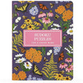 Sudoku puzzles book with floral and butterfly design on a purple background