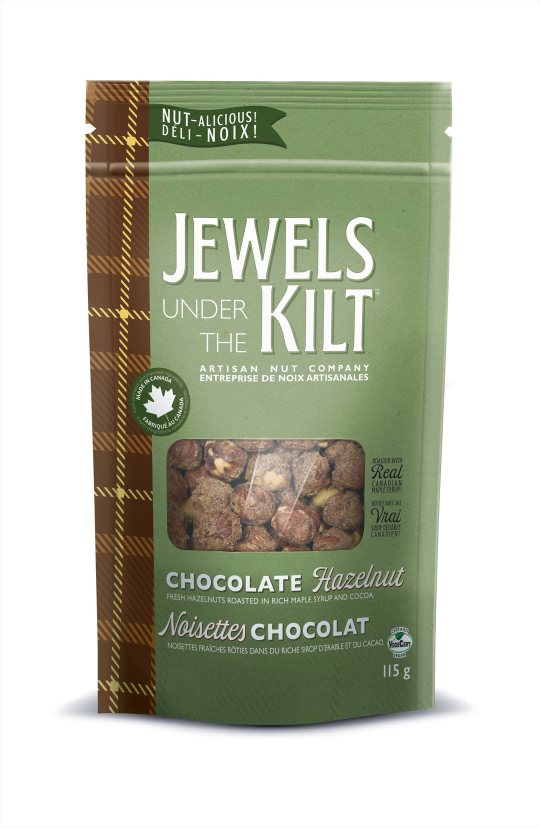 A 115g stand-up pouch of Jewels Under the Kilt Chocolate Hazelnut nuts, featuring a sage green background, a brown plaid pattern on the left, and a clear window showing the roasted nuts inside.