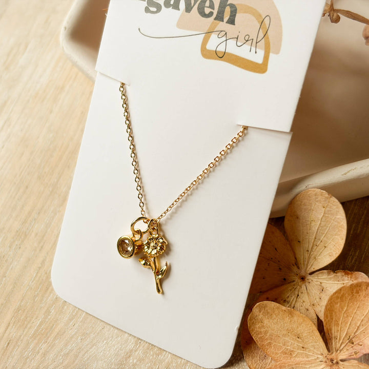 Gold necklace on a &