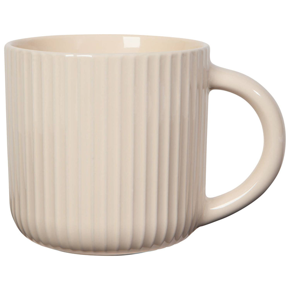 Beige ceramic mug with ribbed texture on a white background