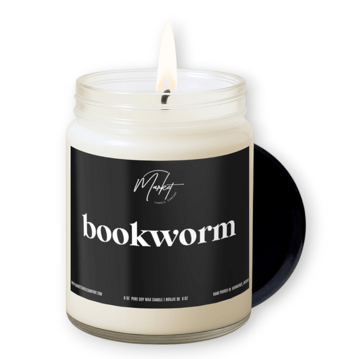 Candle in a jar labeled &