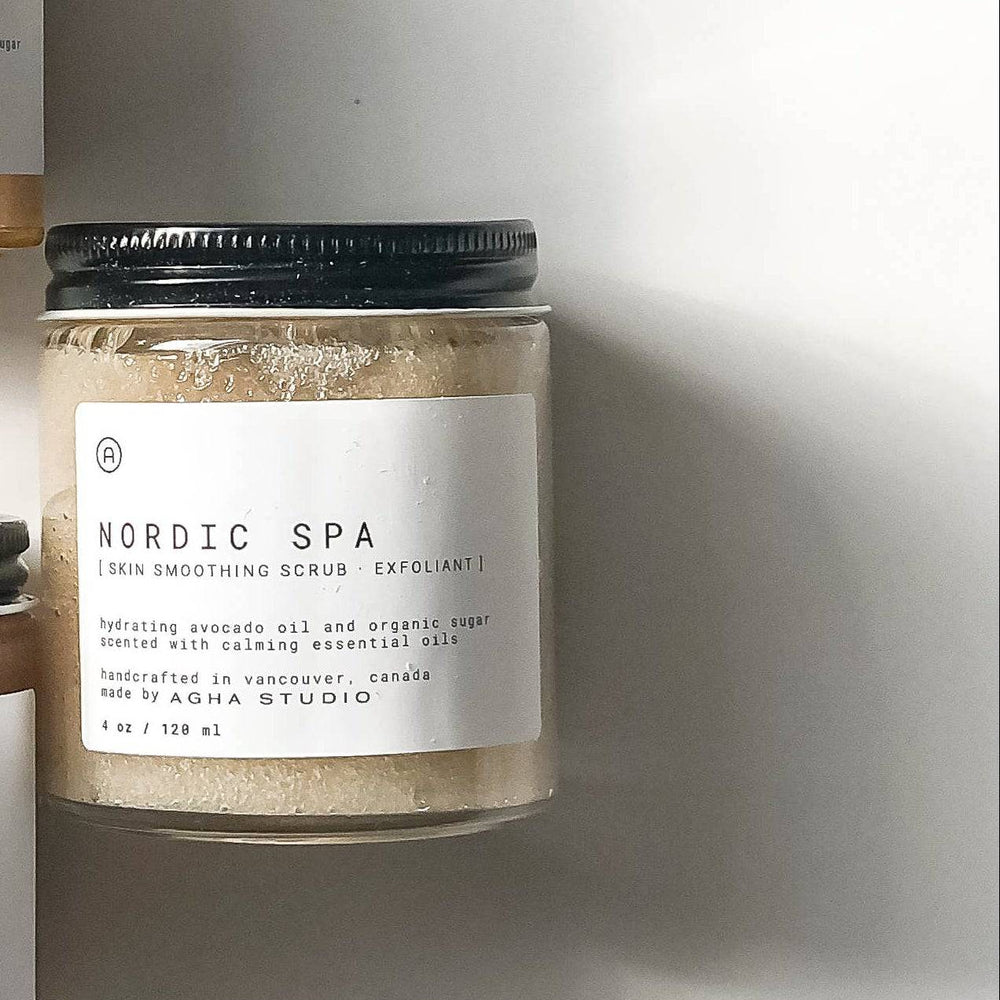 Three skincare products with labels on a white background