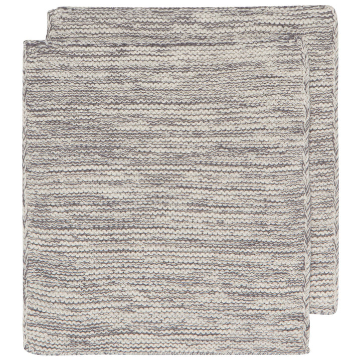Two folded textured gray blankets on a white background