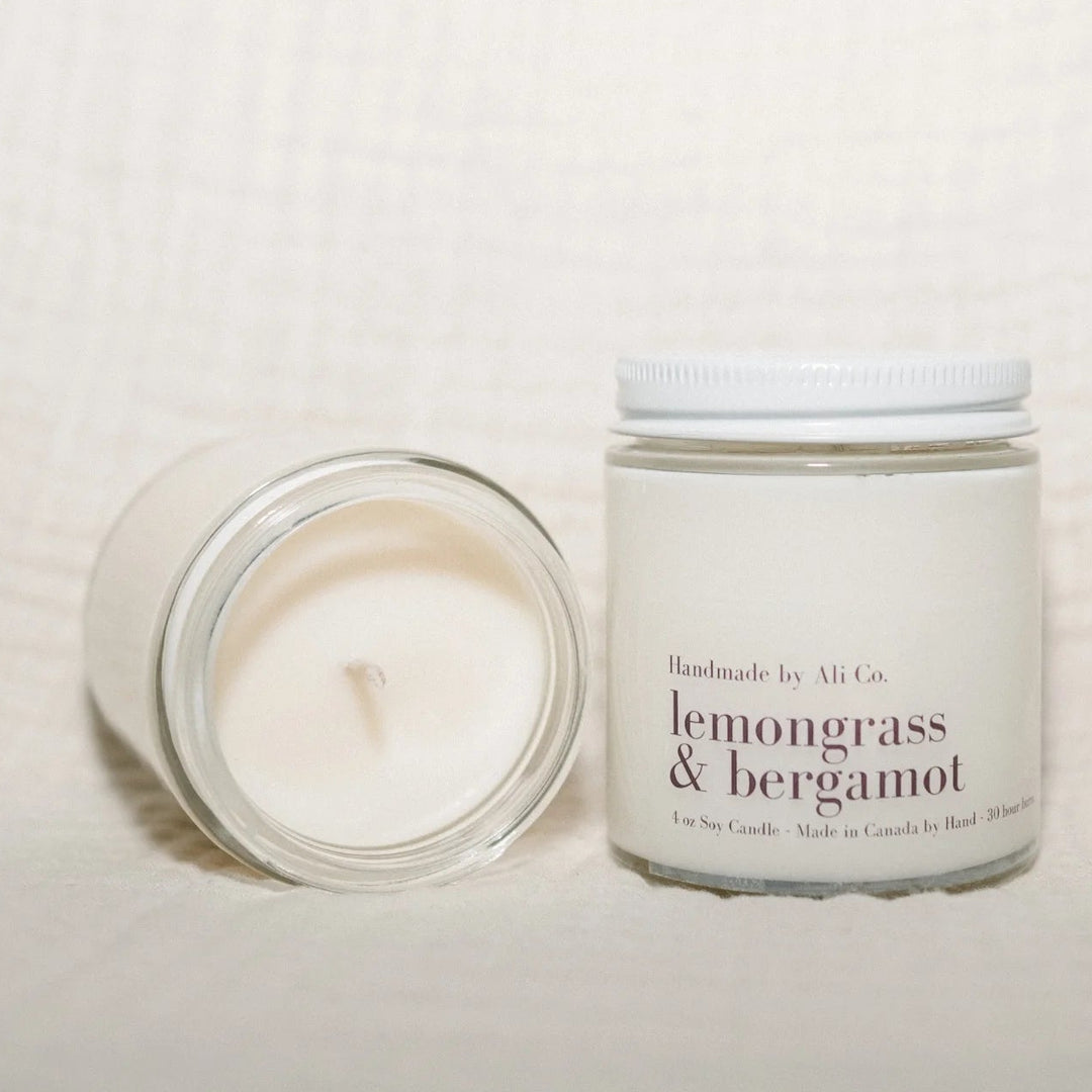 Candle and jar labeled &