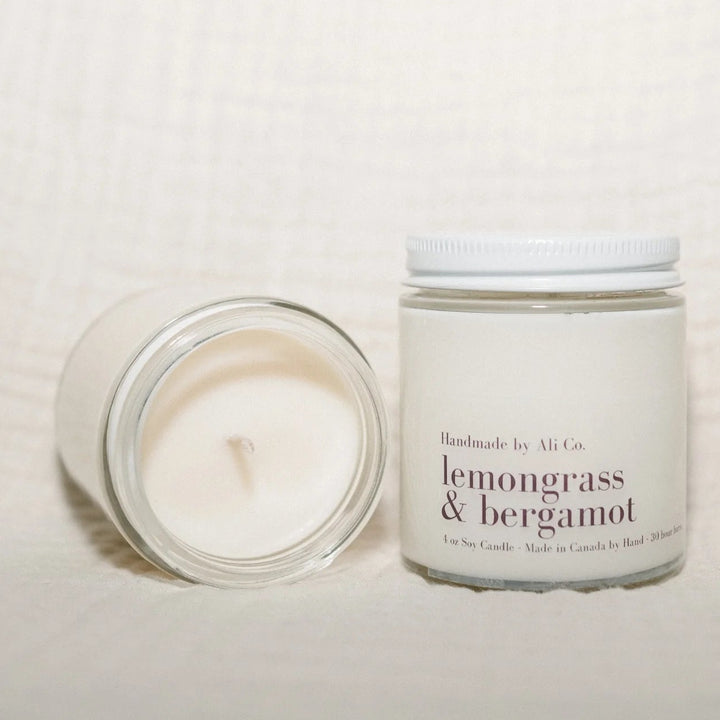 Candle and jar labeled &