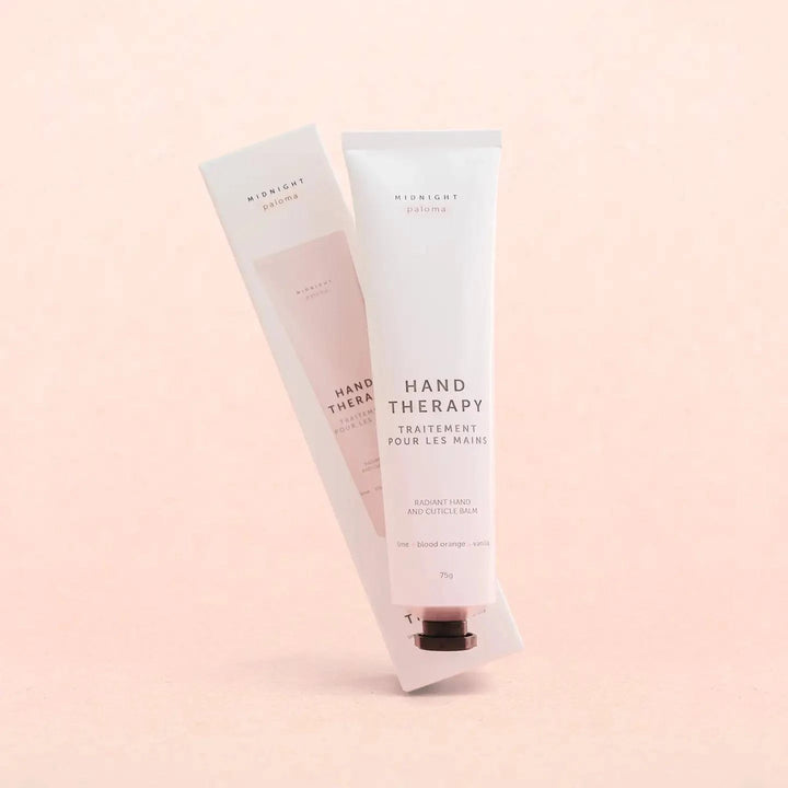 Midnight Paloma Blood Orange and Vanilla hand therapy cream in a sleek jar, perfect for nourishing and moisturizing hands.