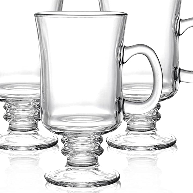 Set of clear glass mugs with footed design on a white background