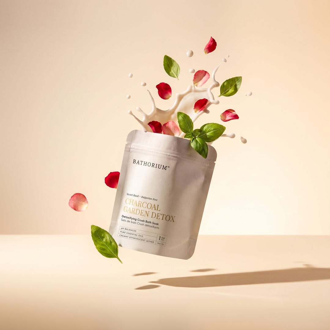 Bathorium Charcoal Garden Detox product with red petals and green leaves on a beige background