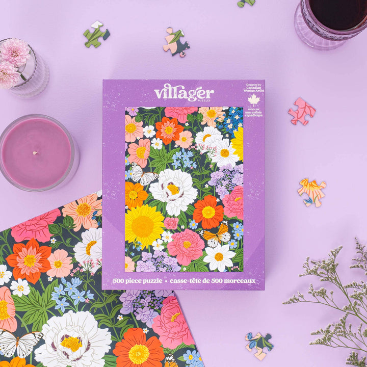 Villager 500 piece puzzle packaging with floral design on a purple background