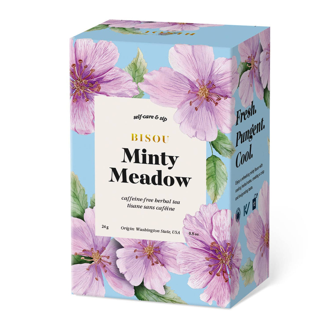 Tea box with floral design and text on a white background