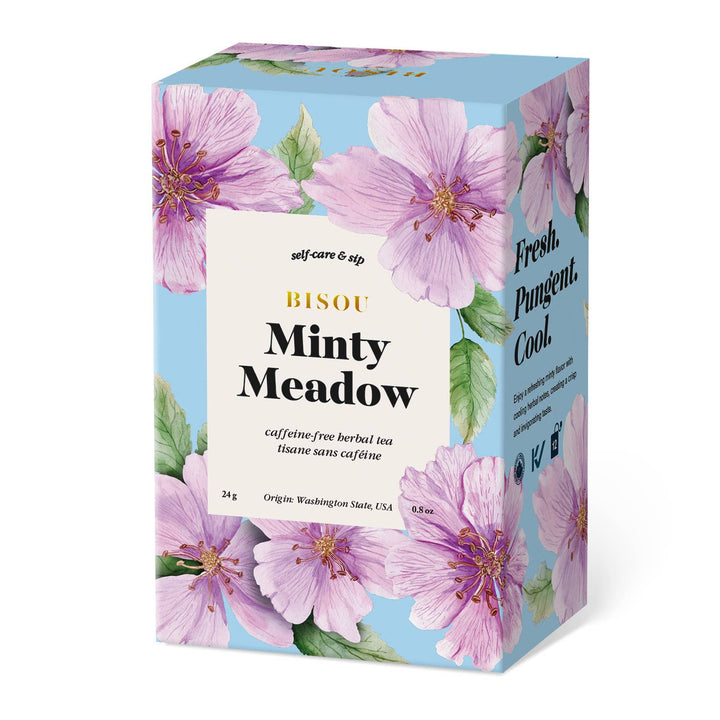 Tea box with floral design and text on a white background
