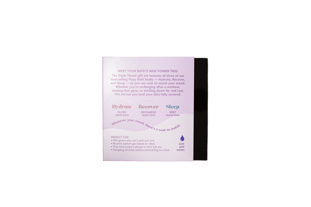 The back of a pinkish-purple and white box for a sleep aid product, with black side panels, photographed on a plain white background.