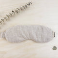 Amma Thérapie lavender eye mask made of hemp and organic cotton sand, designed for relaxation and therapeutic use.