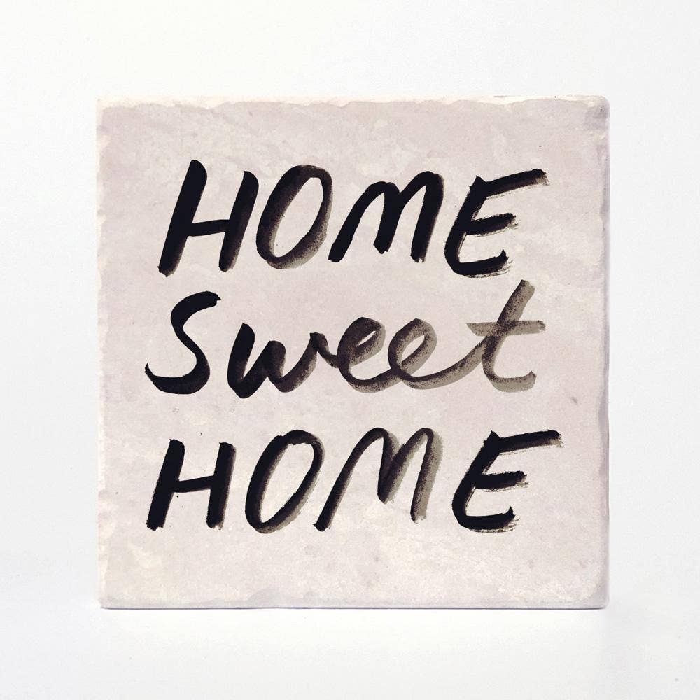 Set of four 4x4 housewarming coasters by Versatile Coasters Canada, featuring decorative designs for protecting surfaces.