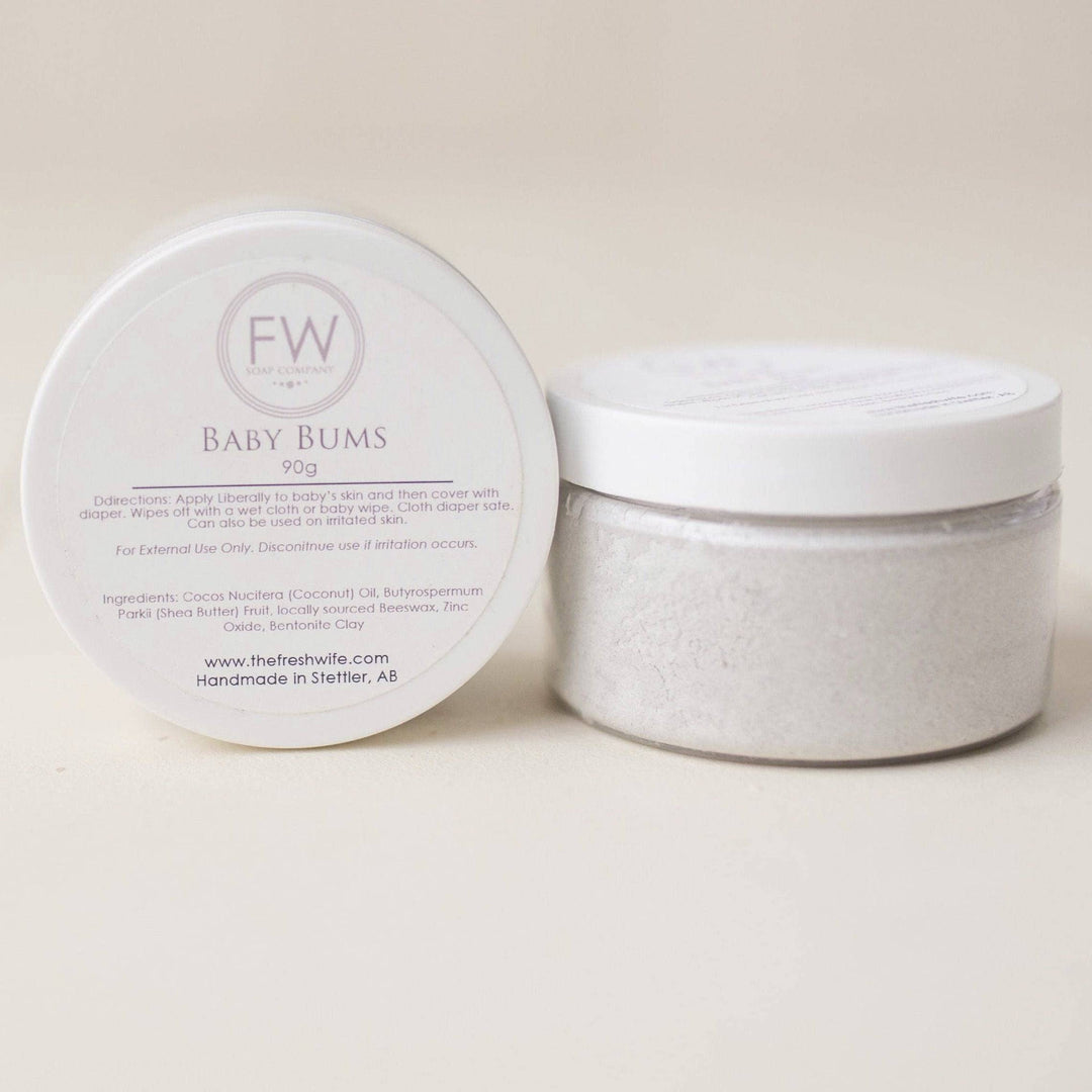 White container with lid on a beige background
