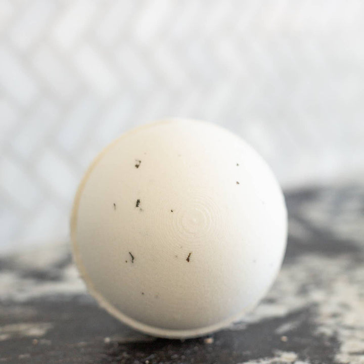 Minty Mix bath bomb from Oak &amp; Aspen Soapery with a colorful, round design and textured surface, perfect for relaxing baths.