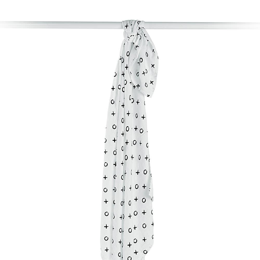White scarf with black plus signs on a white background