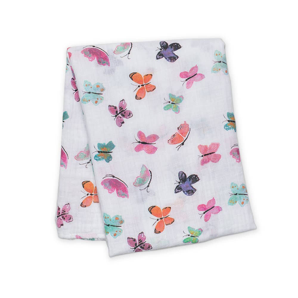 Soft Lulujo Baby muslin swaddle blanket featuring a delicate butterflies pattern in light pastel colors.