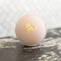 Lavender oatmeal bath bomb from Oak & Aspen Soapery, showing a colorful, round bath bomb with lavender and oatmeal ingredients.