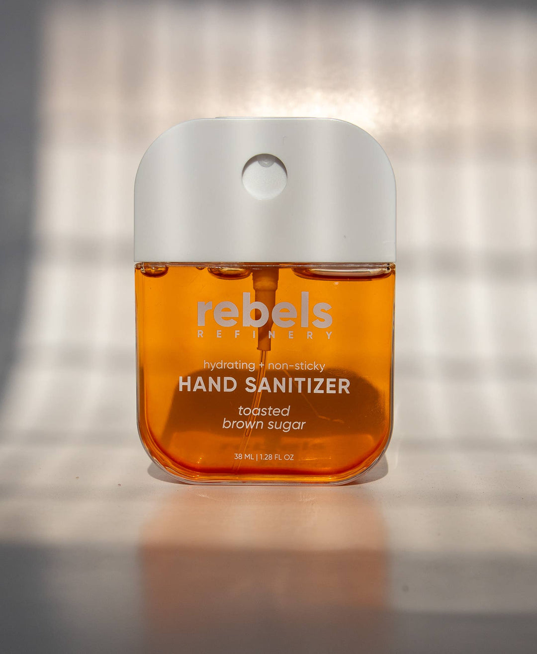 Hand sanitizer bottle with &
