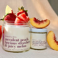 Two jars of succulent peach, luscious strawberry & juicy melon scented product with fruit on top.