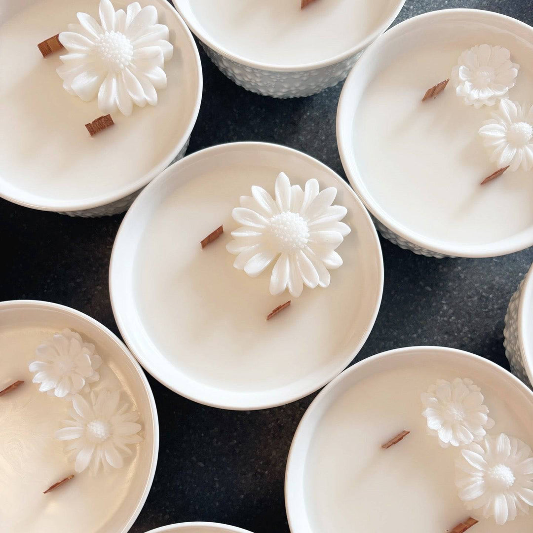 Dark plum and vanilla scented candle in a bowl from Crushed Candle Company, with raspberry accents and warm, cozy appearance.