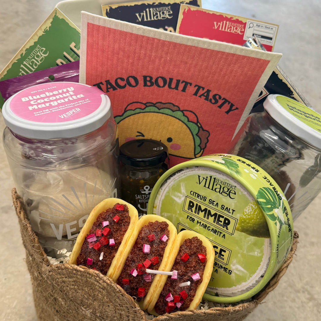 Taco Tuesday gift basket by Gift Smack Gift Company with assorted taco ingredients in a cardboard box.