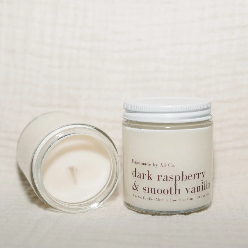Candle and jar labeled &