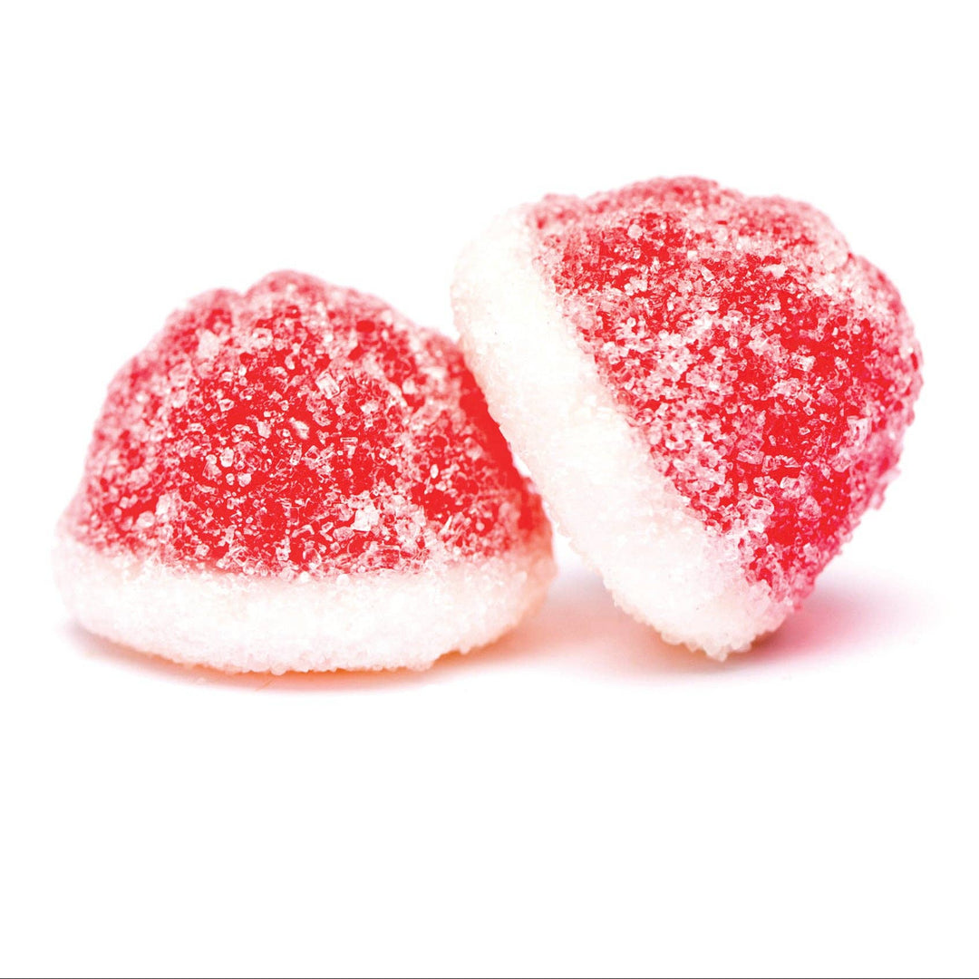 Two red heart-shaped gummy candies with white sugar on a white background