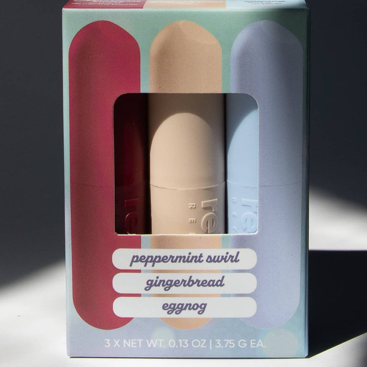 Rebels Refinery Holiday 3 Pack Sleek Sticks lip balm set with three smooth, moisturizing lip balms in festive packaging.