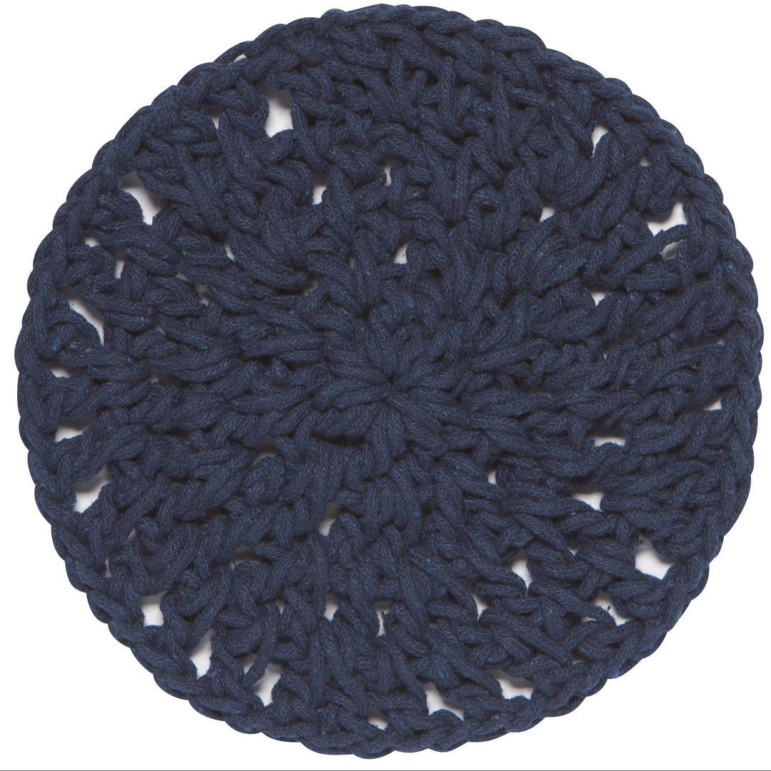 Round blue crocheted doily on a white background
