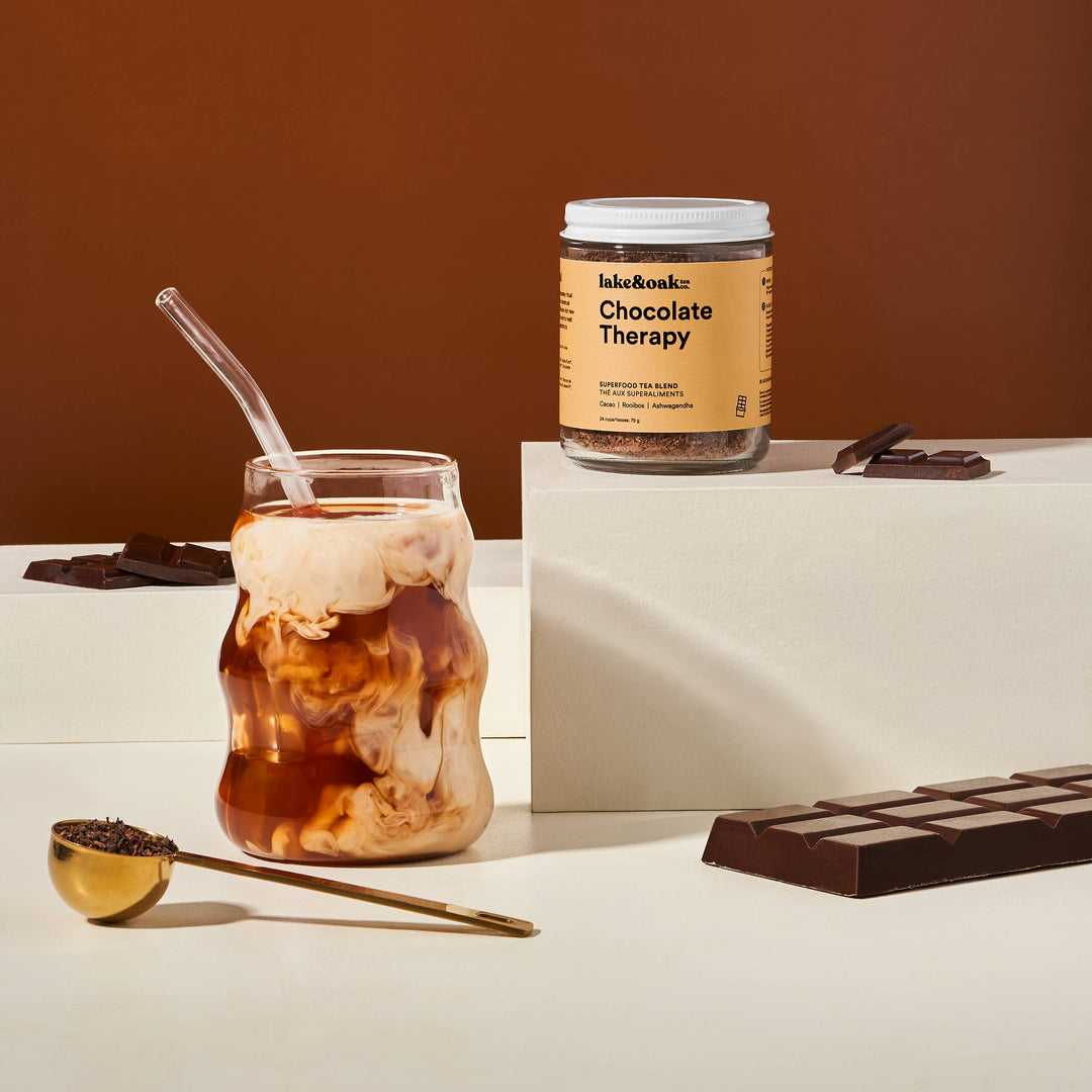 Iced coffee with a jar labeled &