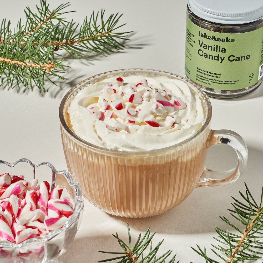 Glass jar of Vanilla Candy Cane loose-leaf tea by Lake & Oak Tea Co. with a clear view of the tea leaves inside.