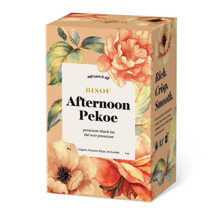 Bisou Afternoon Pekoe tea box with floral design on a white background