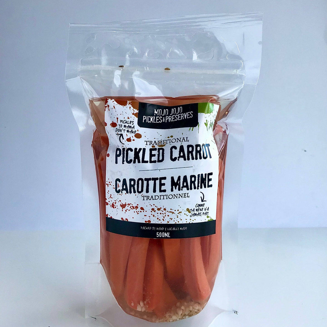 Packaged pickled carrots with a label on a white background