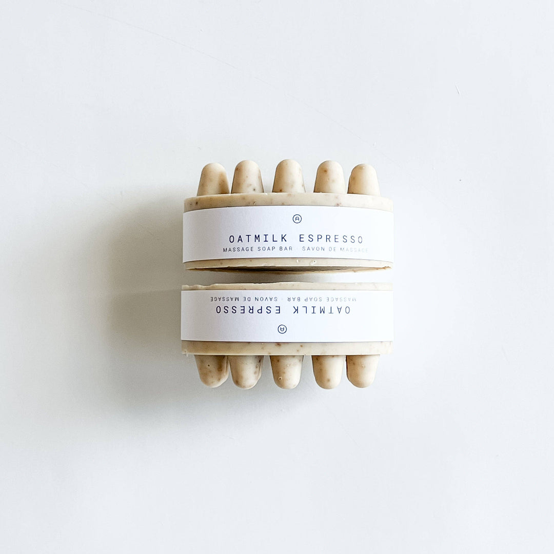 Bar of soap with 'Oatmilk Espresso' label on a white background