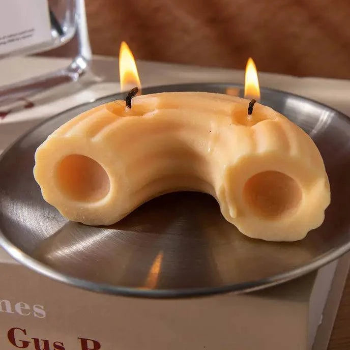 Rigatoni Pasta Candle by Southlake Gifts Canada featuring a realistic pasta-shaped candle with detailed ridges and warm candlelight glow.